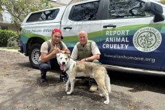 04-18-2025-Officer-Tyler-Bingo-and-Humane-Investigator-Robert-Church-with-Zuko-A0058330311-and-Service-Truck-in-Background